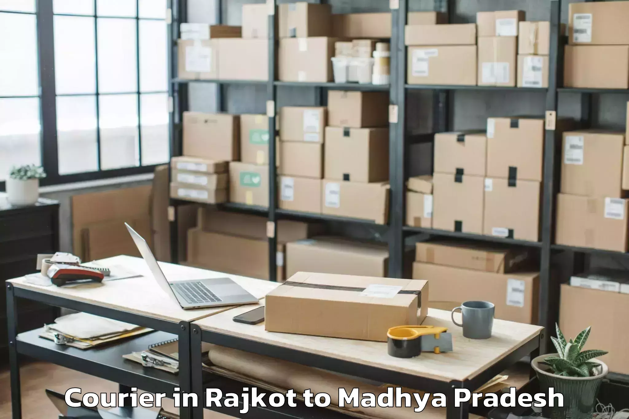 Reliable Rajkot to Bamora Courier